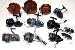 REELS: (11) Three Nottingham wood and brass reels, a 3