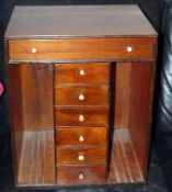 CABINET: Mahogany wood collector's cabinet, with 6 rectangular small pull out drawers 12