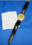 WATCH: Shakespeare gilt finish wrist watch, 33mm casing, gold face with Shakespeare logo, leather