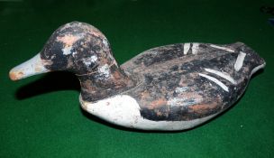 DECOY; A vintage hand carved wooden decoy duck, 15