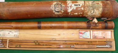 ROD & TUBES: (3) A large heavy vintage hollow bamboo rod tube with leather cap, 58