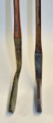 Guttie ball era thick straight blade putter with sharp neck crease and stout hosel with a faint