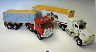 Classic 18-Wheeler Jim Beam Whisky Decanter together with a Dump Truck Whisky Decanter with original