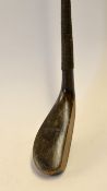Late Tom Morris St Andrews longnose putter fitted with a long narrow dark stained beech wood head