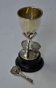 Miniature Silver Tennis Trophy dated 1927 at 12cm in height, the cup is supported by three