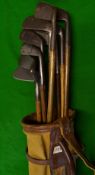 9x assorted irons in canvas circular bag - Forgan Smith's pat anti-shank mashie, Wm Gibson