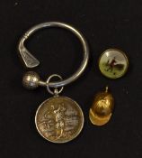 Tiffany & Co sterling silver safety ring and a silver hallmarked golf medal engraved on the back