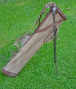 Good canvas and leather oval golf bag fitted with Patent 