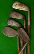 5x irons - 2x niblicks, 2x mashies and mid iron