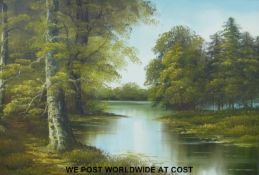 An acrylic on board of a lake or river in a woodland setting signed indistinctly bottom left