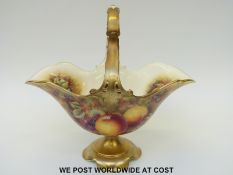 Royal Worcester painted fruit pedestal basket, signed J Skerret (26cm tall,