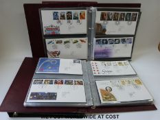 Four albums of GB first day covers
