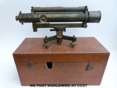 A cased Houghton & Simms brass surveyor's level