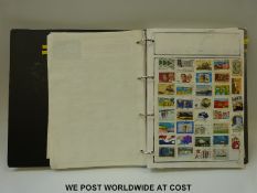A collection of stamps from Australia, Australian States & New Zealand in a folder,