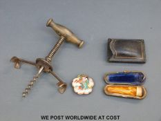 A Japanese Satsuma buckle, Baltic amber cigar holder,