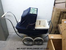 A 1940s Marmot doll's pram