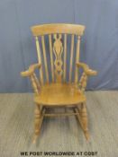 A beech Windsor rocking chair and one other