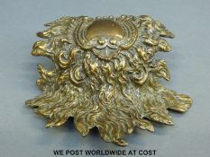 A gilt modelled as a sunburst/flowing hair furniture mount