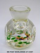 William Manson faceted glass ink/scent bottle paperweight with a yellow and purple pansy with green
