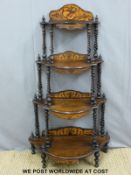 A 19thC mahogany serpentine fronted five tier whatnot with rope twist support and fretwork finical