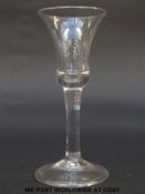 George II wine glass with elongated trumpet bowl over plain stem raised on folded foot, c1760, 15.