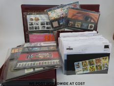 A large quantity of GB presentation packs in seven albums and a box of loose packs
