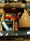 An oak letter stand, military badges, coins, nutcracker,