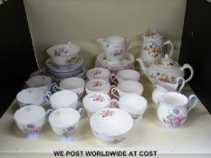 Two Shelley part tea sets decorated with pink roses including six trios,