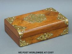 A 19thC brass bound walnut card game or similar box with playing card decoration to lid (width