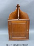 A late 19th early 20th century hanging corner cabinet (H78xW42cm)