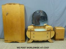 A birds eye maple Art Deco style bedroom suite comprising dressing table, wardrobe and pot cupboard.
