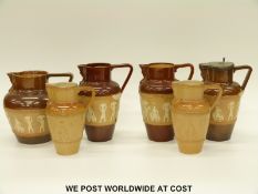 Six Doulton Lambeth salt glazed jugs,
