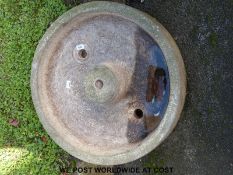A reconstituted stone circular trough press (73cm diameter)