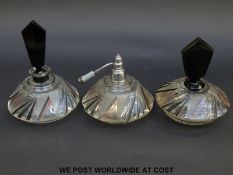 An Art Deco style glass dressing table set comprising scent bottle,
