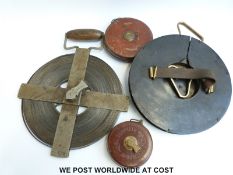 Two large tape measures, one Chesterman, the other Lufkin 200ft,