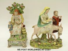 An early 19thC Staffordshire figure of Jesus,