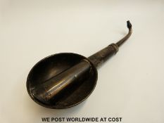 A late 19th / early 20thC metal ear trumpet hearing aid with extending main arm,