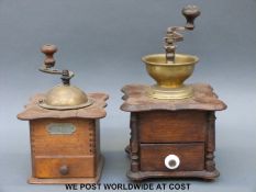 Two vintage wooden coffee grinders including a German example