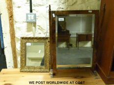 A gilt framed bevelled edge mirror,