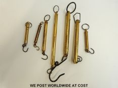Seven cylindrical spring balances to include Salter