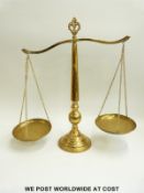 A set of Eastern brass banking type scales,