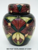 Moorcroft lidded ginger jar with tubelined flower decoration,