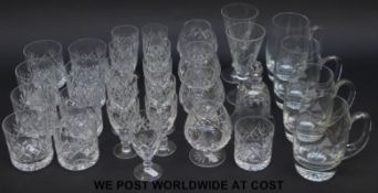 A collection of Royal Doulton and other cut glasses including wine glasses,