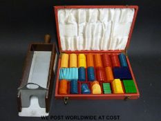 A cased set of vintage poker chips and a dealer's or banker's box