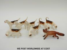 Seven Beswick hounds together with a fox