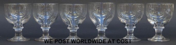A set of six Georgian glass rummers or drinking glasses, each approximately 13.5cm tall.