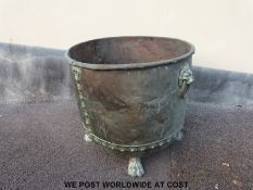 A 19th century riveted copper log bin with lion mask handles and paw feet (H44 x D52cm)