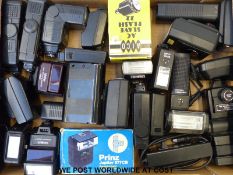 Two boxes of photographic accessories to include flash units by Nikon Olympus and Minolta plus