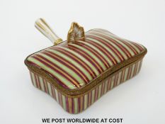 A French ceramic sweetmeat serving box with hinged lid and handle decorated in green,