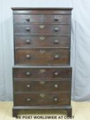 A Georgian mahogany chest on chest, the top fitted with two over three drawers,